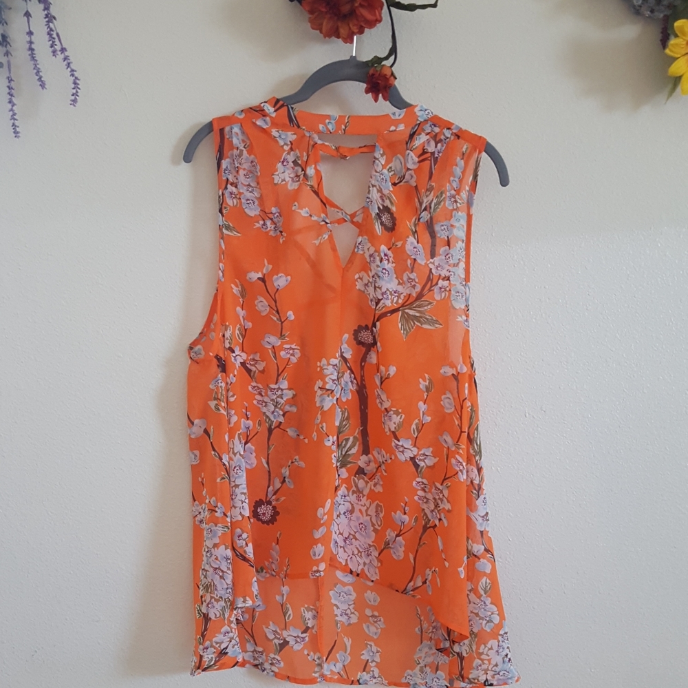 Orange floral sleeveless blouse, size M